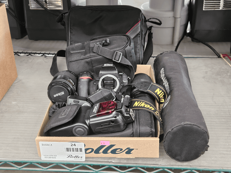 Nikon D300 Camera, AF Nikkor 28-105mm, 28-80mm, 70-300mm Lenses, SB-900 Flash, SB-50DX Flash, Manfrotto Tripod - Roller Auctions