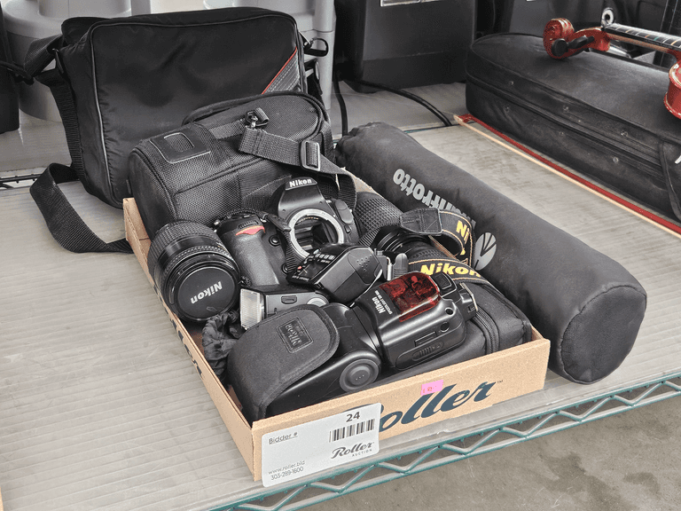 Nikon D300 Camera, AF Nikkor 28-105mm, 28-80mm, 70-300mm Lenses, SB-900 Flash, SB-50DX Flash, Manfrotto Tripod