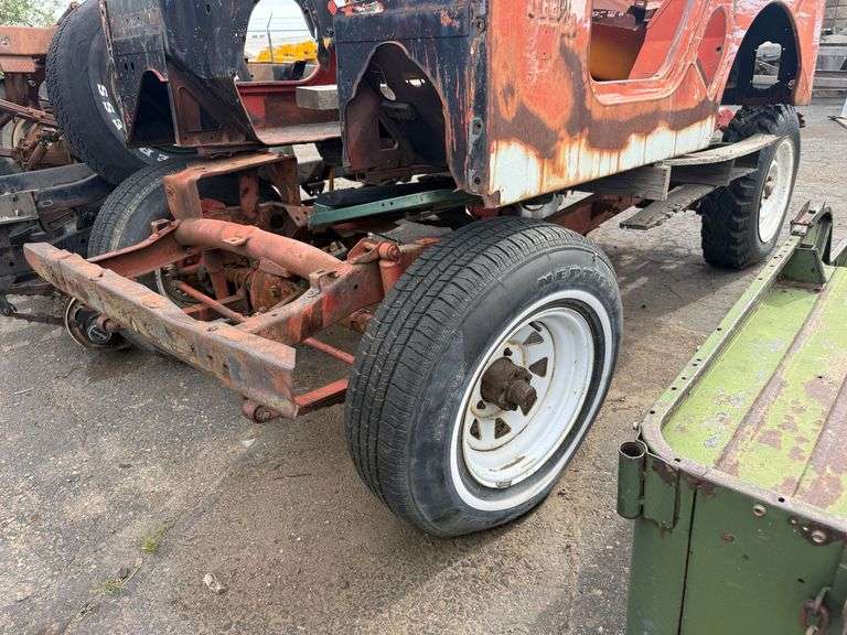 Willys Jeep Body and Frame Assembly with Axles, Wheels, and Additional Parts - Roller Auctions