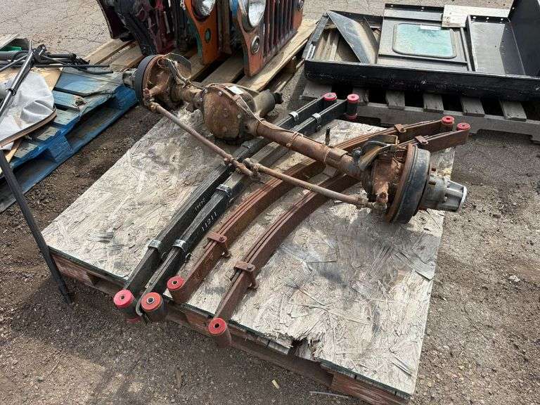 Pallet of Willys Jeep Front Axle Assembly With Leaf Springs and Drum Brakes