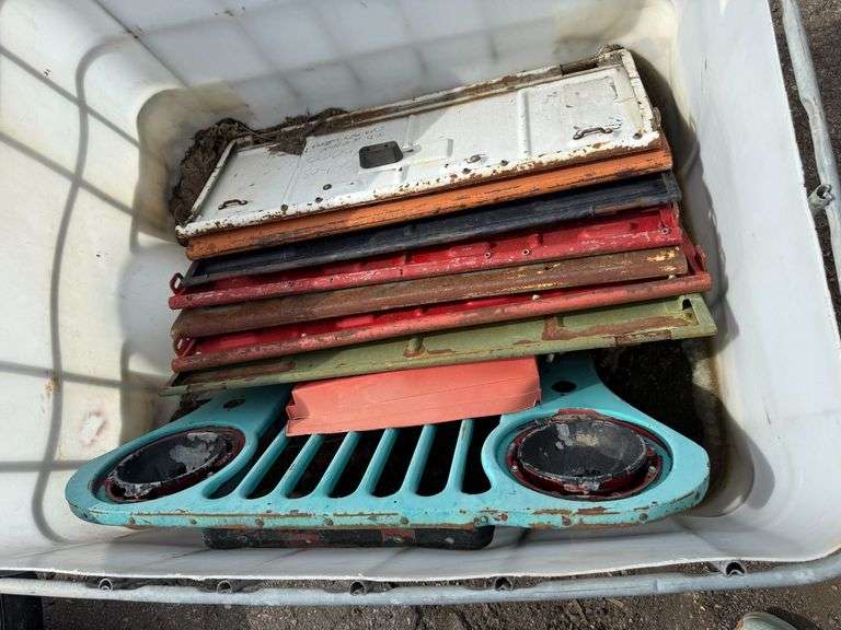 Pallet of Assorted Willys Jeep CJ Grille, Tailgates, and Body Panels - Roller Auctions