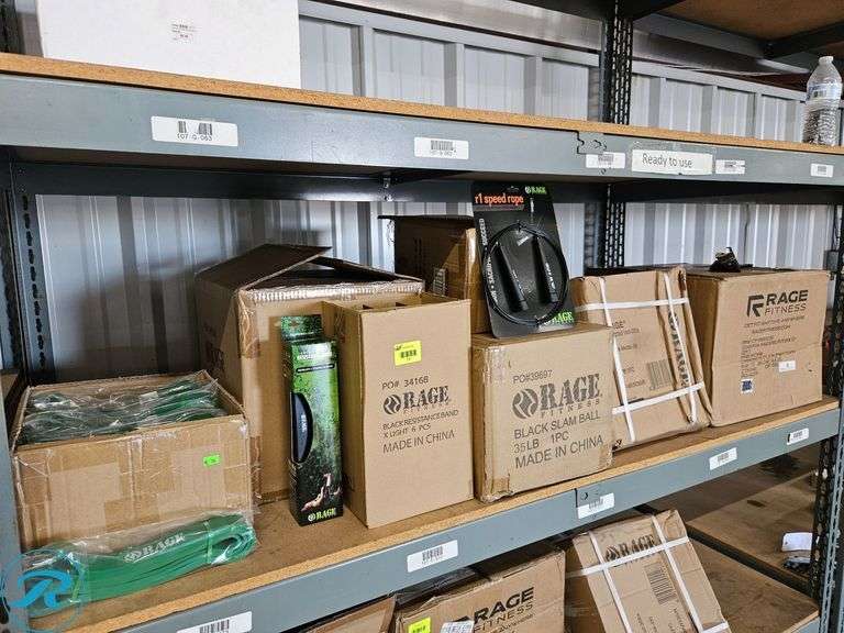 Shelf of New Fitness Equipment: Resistance Bands, Speed Ropes, 35lb Slam Balls, 12" Steel Plyo Box, 36lb Weighted Vest