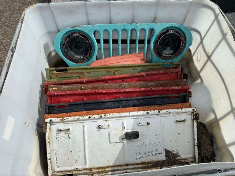 Pallet of Assorted Willys Jeep CJ Grille, Tailgates, and Body Panels - Roller Auctions