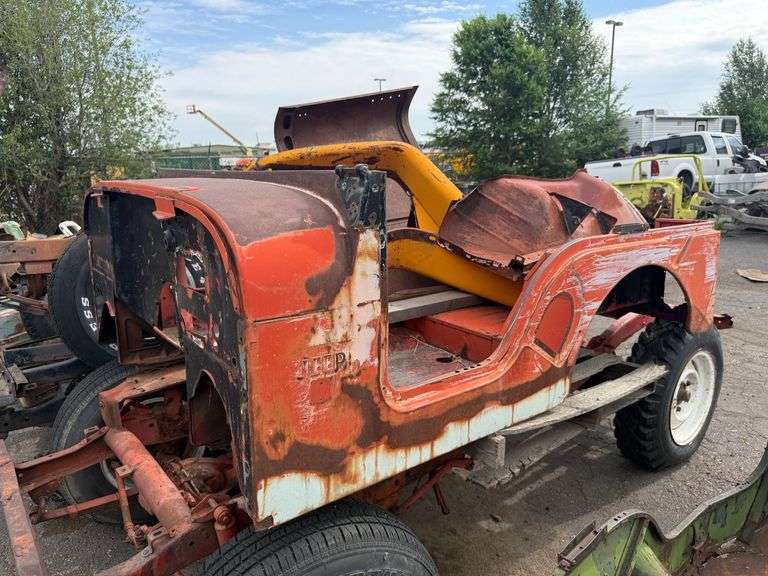 Willys Jeep Body and Frame Assembly with Axles, Wheels, and Additional Parts - Roller Auctions