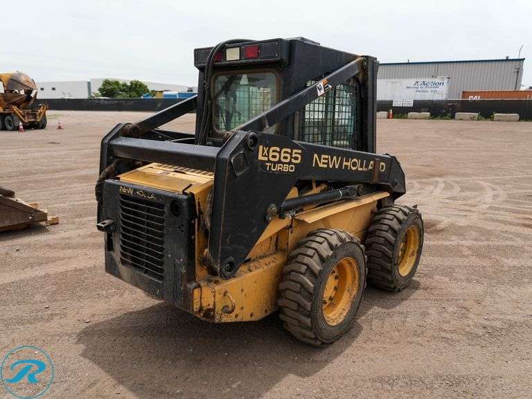 1999  New Holland  LX665   Skid Steer Loader - Roller Auctions