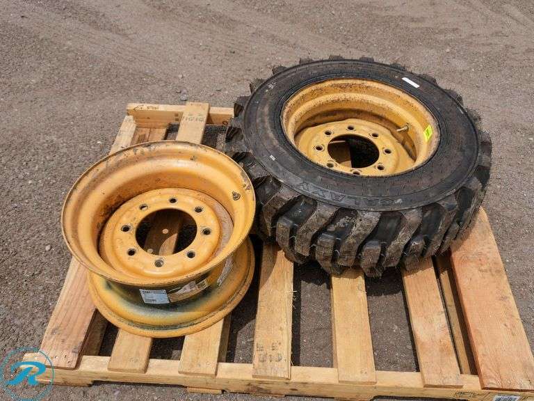 (2) Titan 16.5 x 8.25 Skid Steer Wheels, (1) Galaxy XD2010 10-16.5 10-Ply Tire