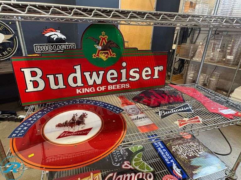 Shelf of Assorted Beer Signs