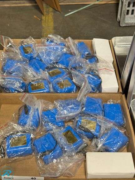 (2) Trays of Goldberg Brothers Li-ion Power Packs With Batteries and Charges