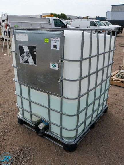 Caged Poly Tank With Approximately 130-Gallons of Diesel Exhaust Fluid (DEF)