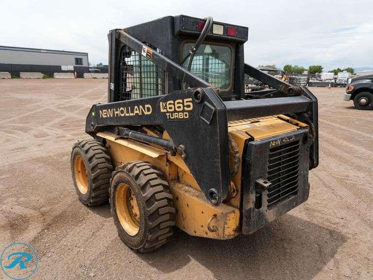 1999  New Holland  LX665   Skid Steer Loader - Roller Auctions