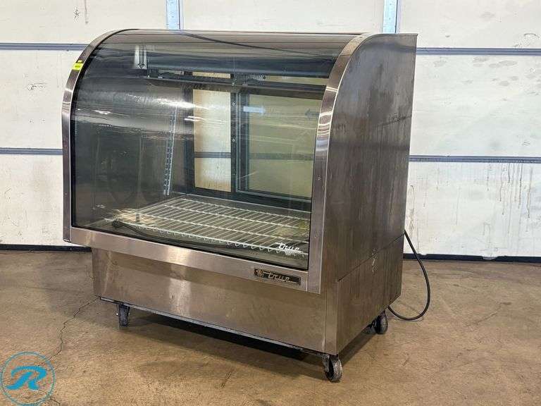 True TCGG-48-S Refrigerated Curved Glass Deli Display Case with Casters