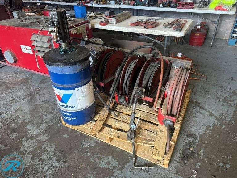 Graco Oil Pump With (4) Hose Reels and Hoses