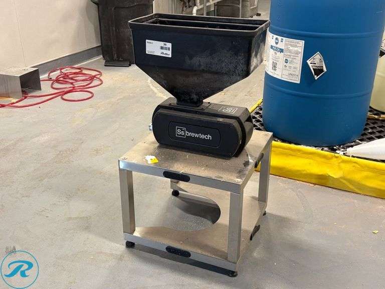 Ss Brewtech Pilot System Grain Mill on Stainless Steel Table