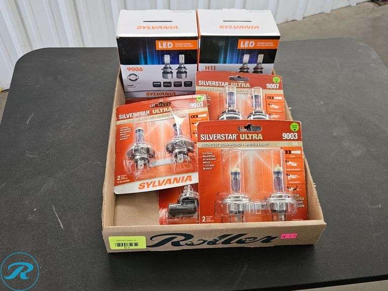 Tray of Sylvania SilverStar Ultra 9003 Halogen Bulbs and Sylvania 9006 LED Bulbs