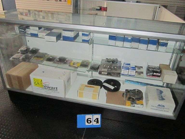 LOT, CONTENTS OF SHOWCASE INCLUDING WATER PUMPS, CONNECTING RODS