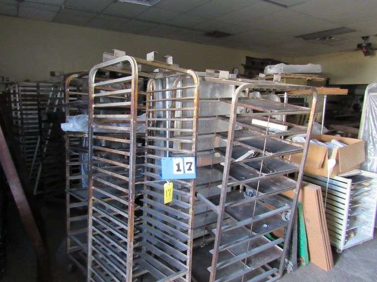 ASSORTED BAKERS RACK, APPROX. (30), INCLUDES SHELVES, BAKERS PANS IN CORNER, WOOD TABLE WITH STAINLESS STEEL TOP APPROX.  7’