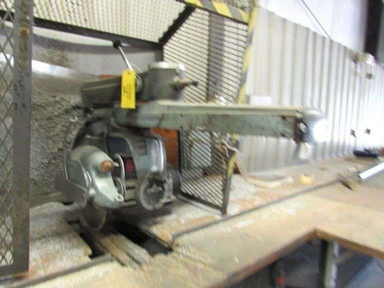 RADIAL ARM SAW, DELTA, 12" 3-HP INCLUDES 14' & 12' TABLES *HARDWIRED - BUYER RESPONSIBLE FOR DISCONNECTION AND REMOVAL*
