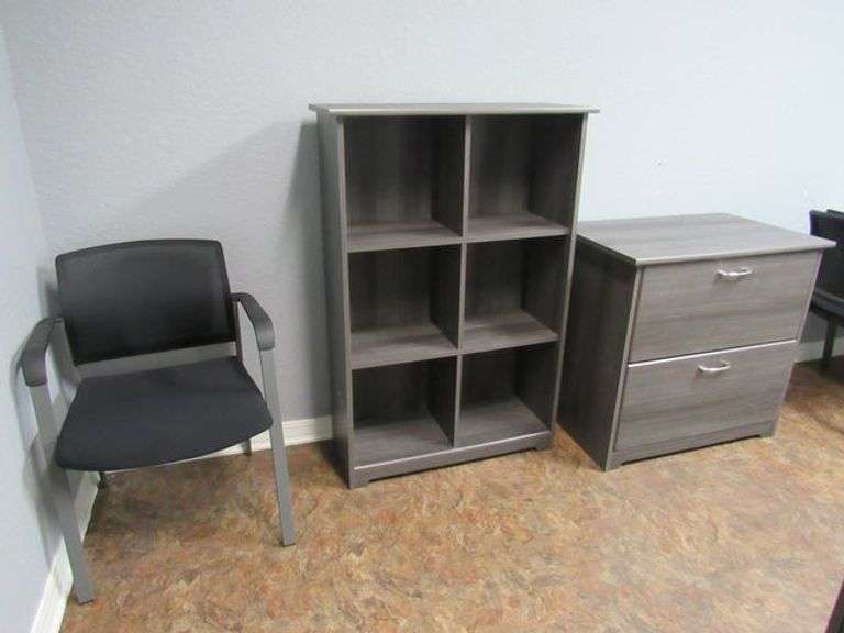 CONTENTS OF ROOM INCLUDING L-SHAPE WOOD DESK, (1) WOOD SHELF, (1) 2-DRWER WOOD FILE CABINET, (1) METAL STORAGE CABINET, (1) PEDESTAL WOOD TABLE, (1) WOOD END TABLE AND (4) WAITING CHAIRS *Located in Offices*
