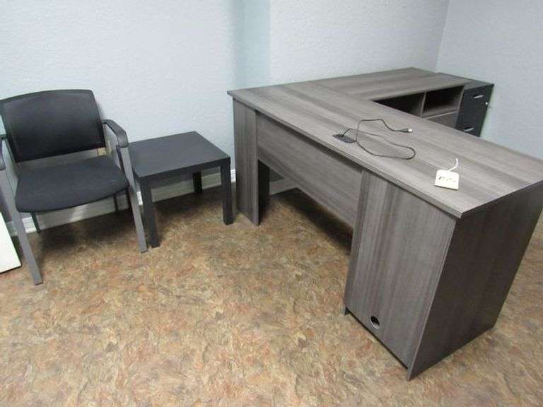 CONTENTS OF ROOM INCLUDING L-SHAPE WOOD DESK, (1) WOOD SHELF, (1) 2-DRWER WOOD FILE CABINET, (1) METAL STORAGE CABINET, (1) PEDESTAL WOOD TABLE, (1) WOOD END TABLE AND (4) WAITING CHAIRS *Located in Offices*