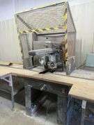 RADIAL ARM SAW, DELTA, 12" 3-HP INCLUDES 14' & 12' TABLES *HARDWIRED - BUYER RESPONSIBLE FOR DISCONNECTION AND REMOVAL*