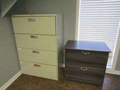 CONTENTS OF ROOM INCLUDING L-SHAPE WOOD DESK, (1) 2-DRAWER WOOD FILE CABINET, (1) 4-DRAWER METAL FILE CABINET, (1) PEDESTAL WOOD TABLE AND (3) WAITING CHAIRS *Located in Offices*