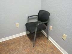 CONTENTS OF ROOM INCLUDING L-SHAPE WOOD DESK, (2) 2-DRAWER WOOD FILE CABINET, (1) WOOD SHELF, (1) OFFICE CHAIR AND (1) WAITING CHAIR *Located in Offices*