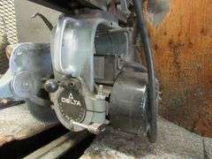 RADIAL ARM SAW, DELTA, 12" 3-HP INCLUDES 14' & 12' TABLES *HARDWIRED - BUYER RESPONSIBLE FOR DISCONNECTION AND REMOVAL*