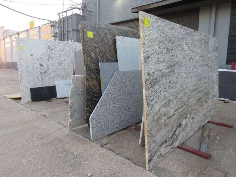 LOT, ASSORTED STONE SLABS AND REMNANTS AS SHOWN INCLUDING (33) PIECES SOLD WITH (6) PAIRS A-FRAMES *LOCATED OUTSIDE OF BUILDING*
