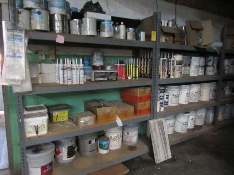 (6) METAL SHELVING WITH PRESS BOARD SHELVES - APPROX. 70" X 19" X 84" SOLD WITH CONTENTS INCLUDING NAILS, ADHESIVES, DRYVIT, PAINT, E-CLIPS, SILICONIZE ACRYLIC AND MORE AS SHOWN