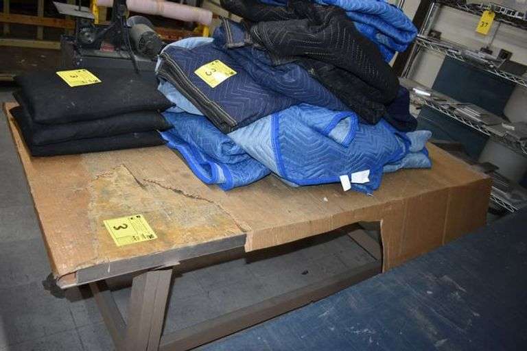 WOOD WORK BENCH, APPROX. 36" X 72" W/CONTENTS, PACKING QUILTS AND SHOT WEIGHT BAGS