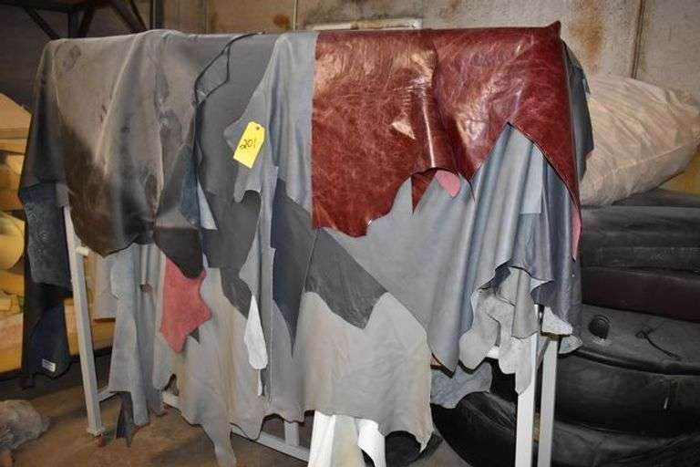 PORTABLE RACK WITH ASSORTED LEATHER AS SHOWN