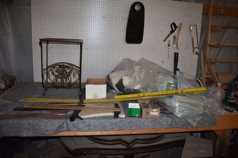 WOOD TABLE WITH CONTENTS ON AND UNDER TABLE AND PEG BOARD AS SHOWN