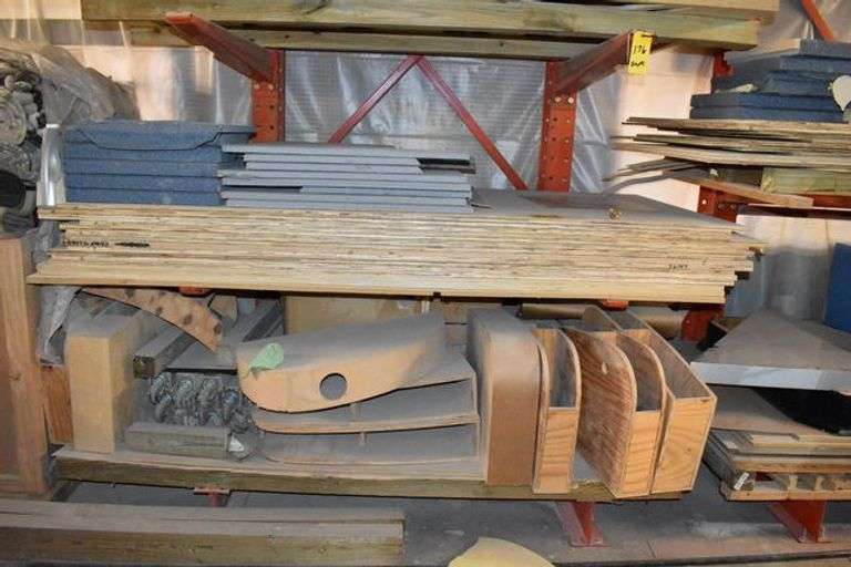 CONTENTS OF (2) SETS OF CANTILEVER RAKS *MOSTLY PLYWOOD WITH APPROX.  (15) GOOD 4' X 8' SHEETS AND APPROX. (45) SHEETS OF USED PLYWOOD, FURNITURE PARTS, A/C BLOWERS AND MORE AS SHOWN