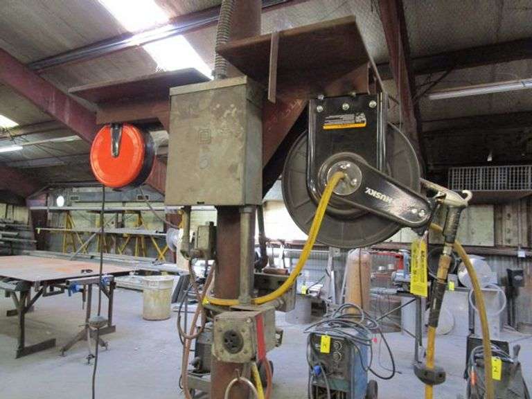 LOT, (1) HUSKY AIR HOSE REEL & (1) HDX 30' RETRACTABLE CORD REEL W/(3) OUTLETS, (1) REEL IS WELDED TO POST