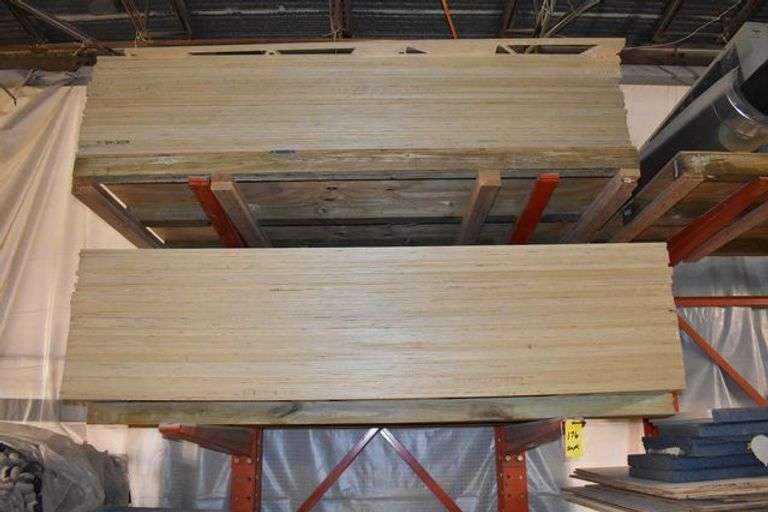 CONTENTS OF (2) SETS OF CANTILEVER RAKS *MOSTLY PLYWOOD WITH APPROX.  (15) GOOD 4' X 8' SHEETS AND APPROX. (45) SHEETS OF USED PLYWOOD, FURNITURE PARTS, A/C BLOWERS AND MORE AS SHOWN