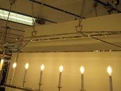 CHANDELIER OR PENDANT AS SHOWN * REFER TO PHOTOS * BUYER RESPONSIBLE FOR REMOVAL - BRING TOOLS AND LADDER AS ITEMS ARE CEILING MOUNTED 12'-14' CEILING HEIGHT*