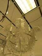 CHANDELIER OR PENDANT AS SHOWN * REFER TO PHOTOS * BUYER RESPONSIBLE FOR REMOVAL - BRING TOOLS AND LADDER AS ITEMS ARE CEILING MOUNTED 12'-14' CEILING HEIGHT*
