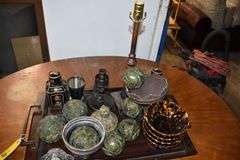 (1) OVAL WOOD TABLE - APPROX. 52" X 43" X 29" AND (1) SERVING TRAY WITH ASSORTED DECOR