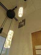CHANDELIER OR PENDANT AS SHOWN * REFER TO PHOTOS * BUYER RESPONSIBLE FOR REMOVAL - BRING TOOLS AND LADDER AS ITEMS ARE CEILING MOUNTED 12'-14' CEILING HEIGHT*