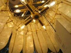 CHANDELIER OR PENDANT AS SHOWN * REFER TO PHOTOS * BUYER RESPONSIBLE FOR REMOVAL - BRING TOOLS AND LADDER AS ITEMS ARE CEILING MOUNTED 12'-14' CEILING HEIGHT*