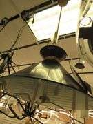 CHANDELIER OR PENDANT AS SHOWN * REFER TO PHOTOS * BUYER RESPONSIBLE FOR REMOVAL - BRING TOOLS AND LADDER AS ITEMS ARE CEILING MOUNTED 12'-14' CEILING HEIGHT*