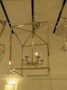 CHANDELIER OR PENDANT AS SHOWN * REFER TO PHOTOS * BUYER RESPONSIBLE FOR REMOVAL - BRING TOOLS AND LADDER AS ITEMS ARE CEILING MOUNTED 12'-14' CEILING HEIGHT*