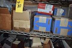 LOT, (2) WIRE RACKS AND (1) WIRE SHELF WITH ASSORTED HARDWARE FOR BUILDING RECLINERS, (1) PALLET, RECLINER PARTS AND (1) PILE OF RECLINER MOTOR ASSEMBLIES AS SHOWN