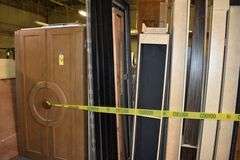 (2) DOOR WOOD ARMOIRE - APPROX. 47" X 29" X 78" WITH ASSORTED WOOD PRODUCTS AS SHOWN