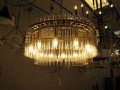 CHANDELIER OR PENDANT AS SHOWN * REFER TO PHOTOS * BUYER RESPONSIBLE FOR REMOVAL - BRING TOOLS AND LADDER AS ITEMS ARE CEILING MOUNTED 12'-14' CEILING HEIGHT*