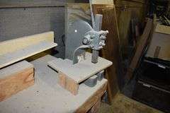 DELTA 10" MITER SAW MDL DW713 110-V SOLD WITH TABLE, VISE AND SMALL PRESS AS SHOWN