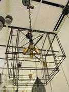 CHANDELIER OR PENDANT AS SHOWN * REFER TO PHOTOS * BUYER RESPONSIBLE FOR REMOVAL - BRING TOOLS AND LADDER AS ITEMS ARE CEILING MOUNTED 12'-14' CEILING HEIGHT*