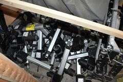 LOT, (2) WIRE RACKS AND (1) WIRE SHELF WITH ASSORTED HARDWARE FOR BUILDING RECLINERS, (1) PALLET, RECLINER PARTS AND (1) PILE OF RECLINER MOTOR ASSEMBLIES AS SHOWN