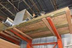 CONTENTS OF (2) SETS OF CANTILEVER RAKS *MOSTLY PLYWOOD WITH APPROX.  (15) GOOD 4' X 8' SHEETS AND APPROX. (45) SHEETS OF USED PLYWOOD, FURNITURE PARTS, A/C BLOWERS AND MORE AS SHOWN