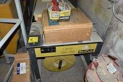 STRAPACK STRAPPING MACHINE WITH (2) ROLLS OF BANDING AND TOOLS AS SHOWN